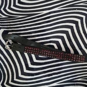 Black and red studded belt